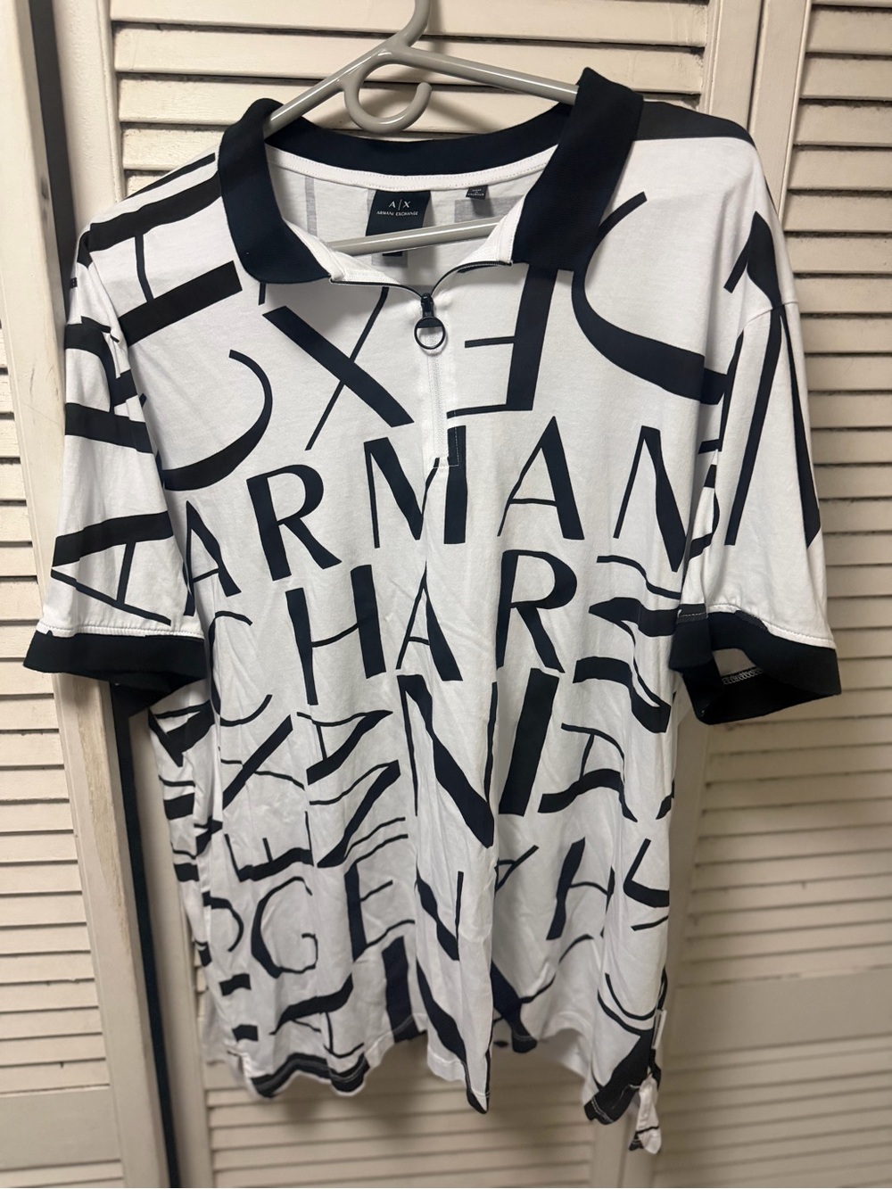 Armani Exchange White Polo with Bold Black Graphic Logo
